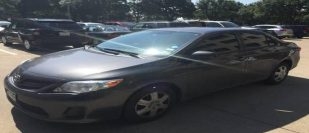 Sparingly used 2011 Toyota Corolla Luxury Edition - Limied dark Grey color - Tinted windows